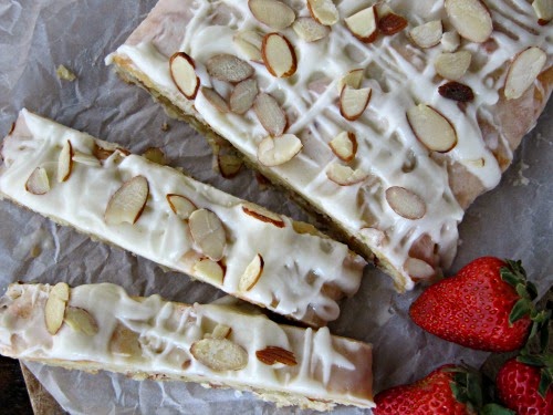 almond-braid with frosting and slivered almonds. 