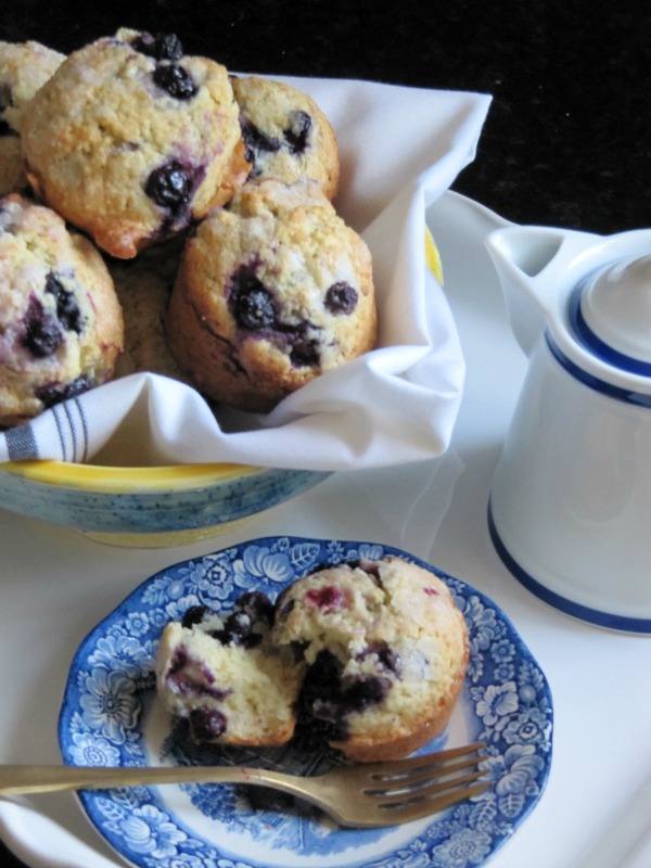 blueberry-muffins in a yellow and blue bowl.