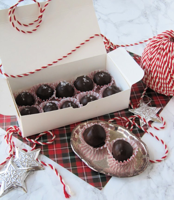 fleur-de-sel-truffles in a white box with red and white twine. 