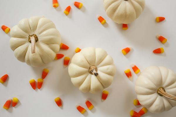 Fall Bucket list, candy corn and white pumpkins.
