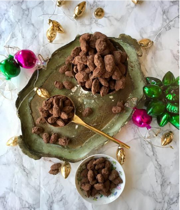 Almond Dragees covered in dark chocolate cocoa powder.