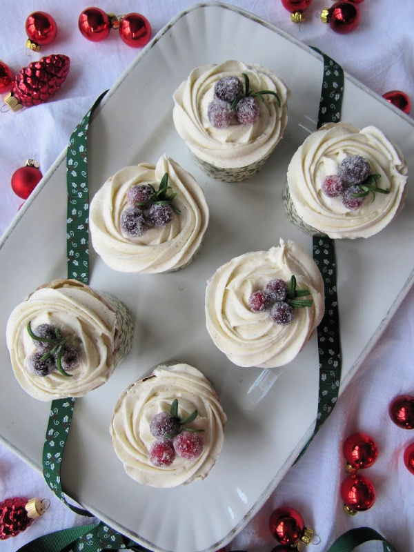 gingerbread-cupcakes-with-buttercream frosting on a white ironstone platter. 