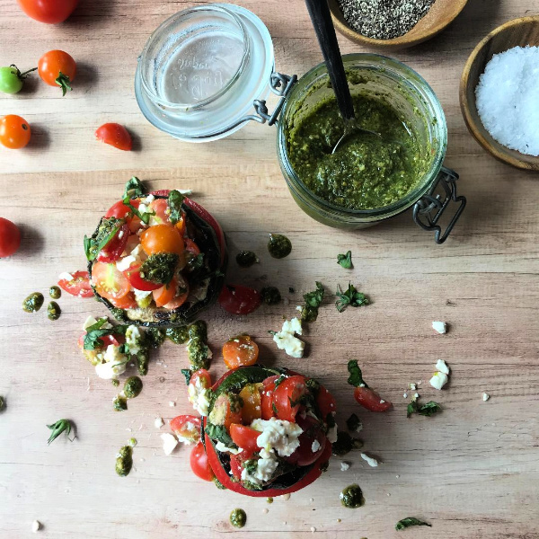Grilled Zucchini and Tomato Stack Salad with feta cheese and pesto.