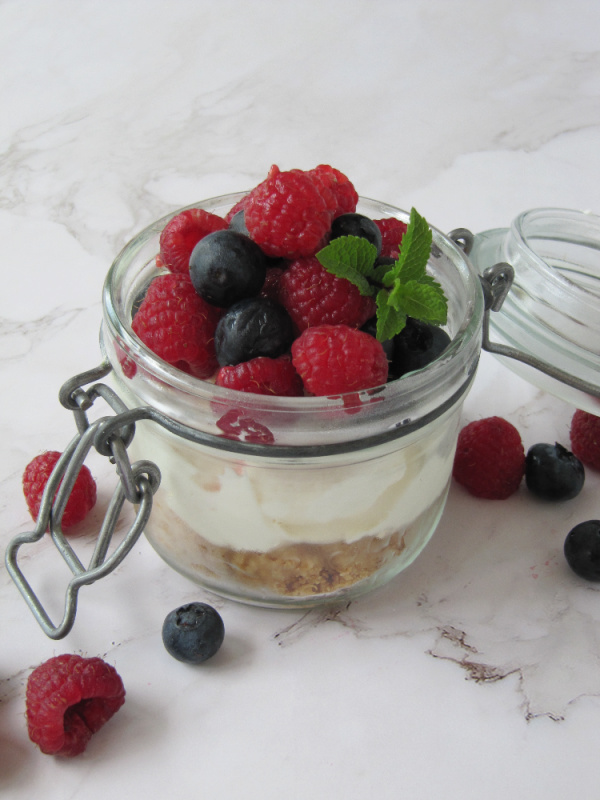 No-bake cheesecake with blueberries and raspberries.