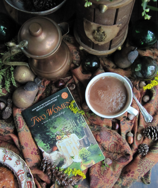 friday favorites two women hot chocolate copper tea pot green glass fishing floats pine cones