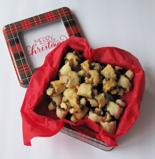 plaid christmas tin filled with christmas cookies
