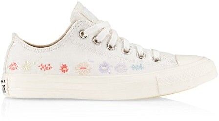 white converse sneakers with pastel flowers
