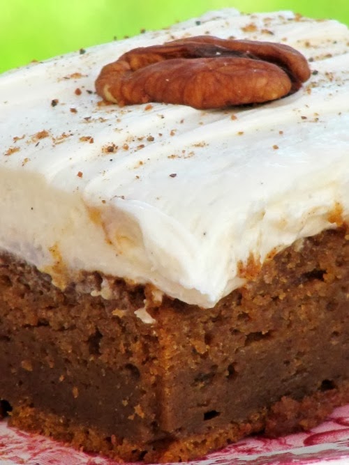 friday favoritespumpkin bars with vanilla bean frosting topped with a pecan.