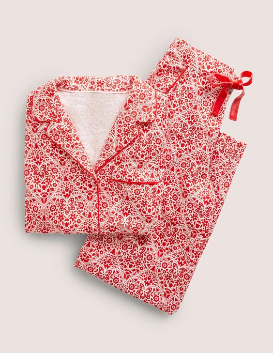 Pair of red and white hearts and flowers pajamas.