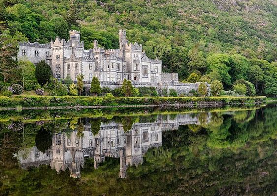 Kylemore Abbey on a lake.