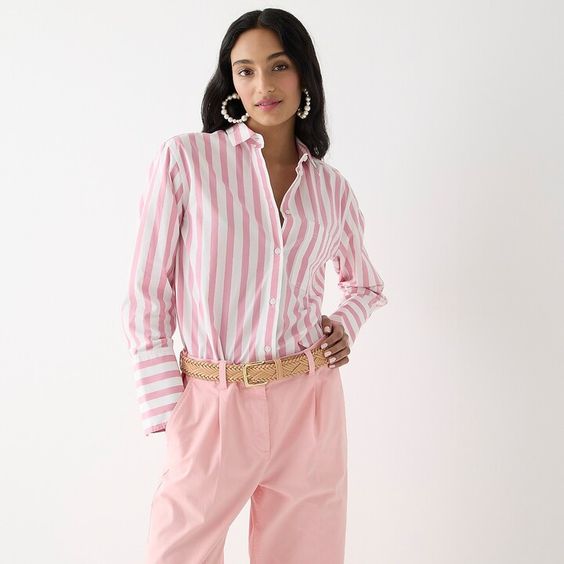 Weekend meandering, woman wearing a pink striped shirt and pants.