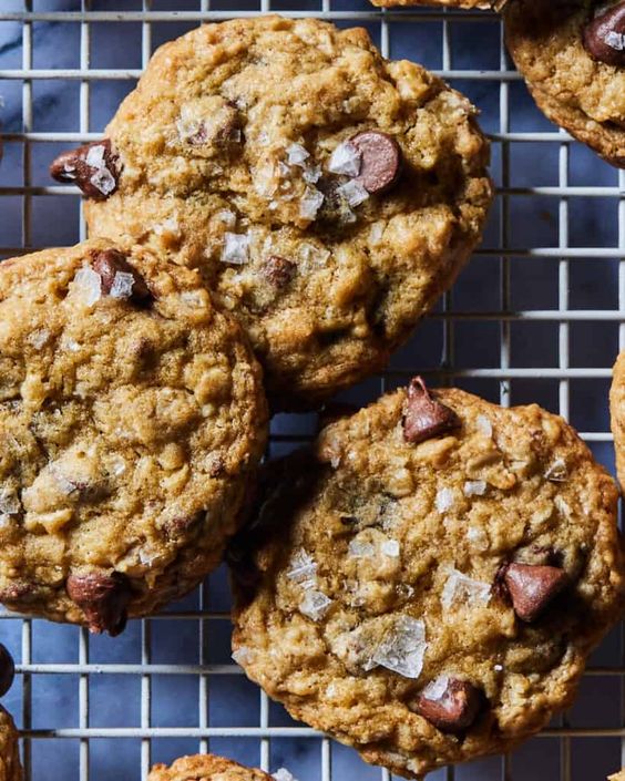 Chocolate Chip oatmeal cookies on a wire rack.