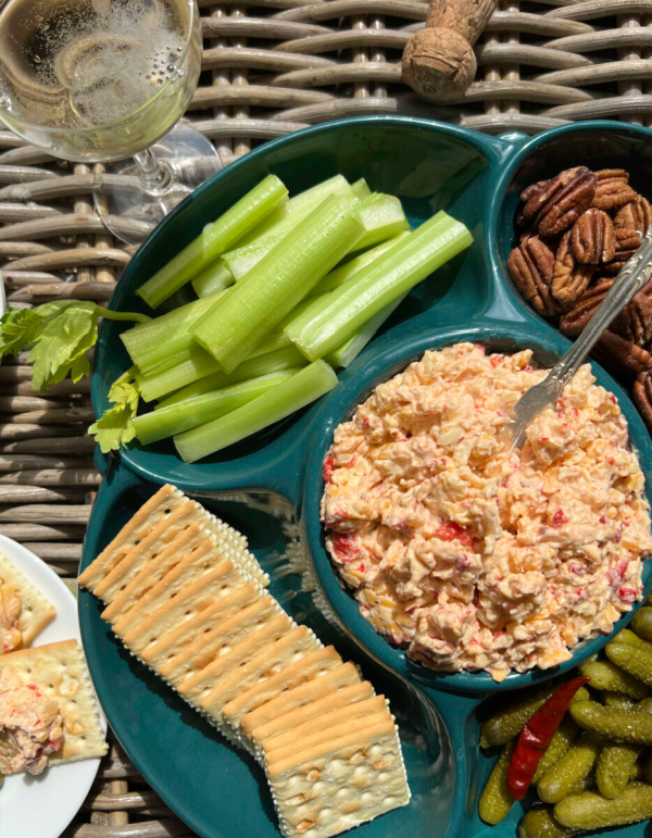 Champagne Pimento cheese Garden and Gun with vegetables.