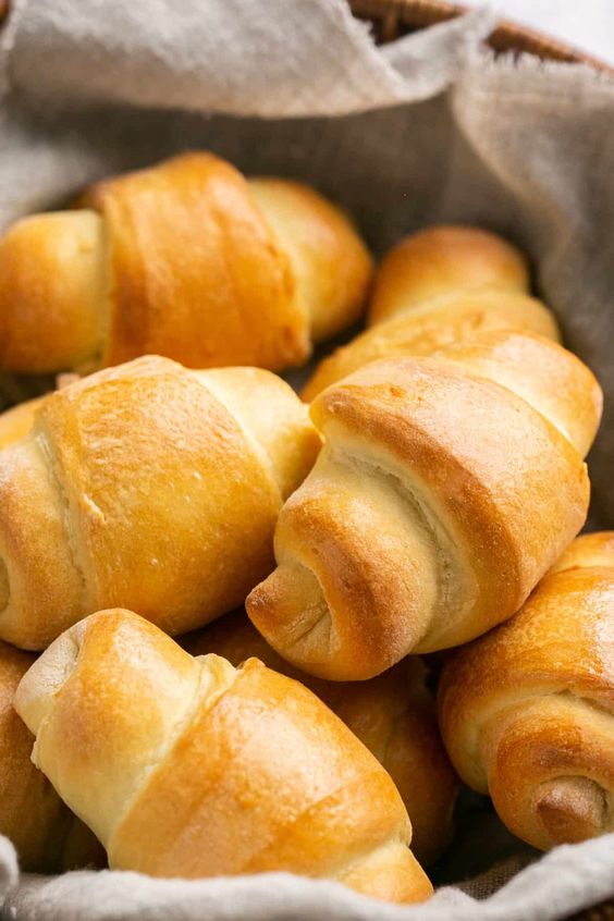 Basket of homemade crescent rolls. 