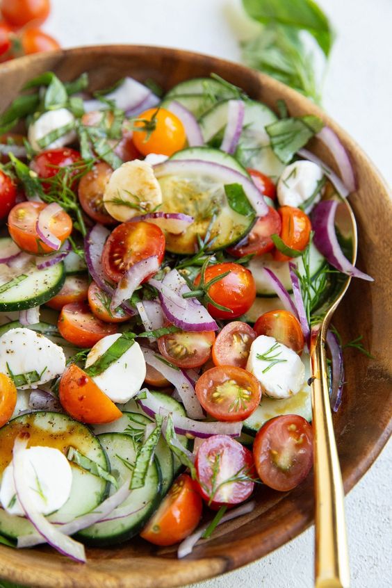 Cucumber, tomato, onion and cheese salad. 