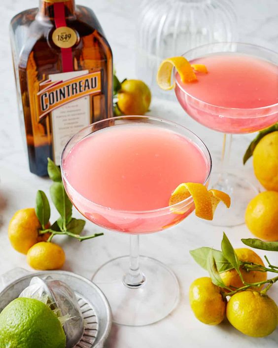Cosmopolitan cocktail in 2 glasses. 