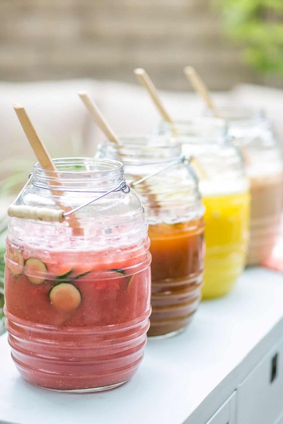Agua Fresca in 4 glass canisters. 