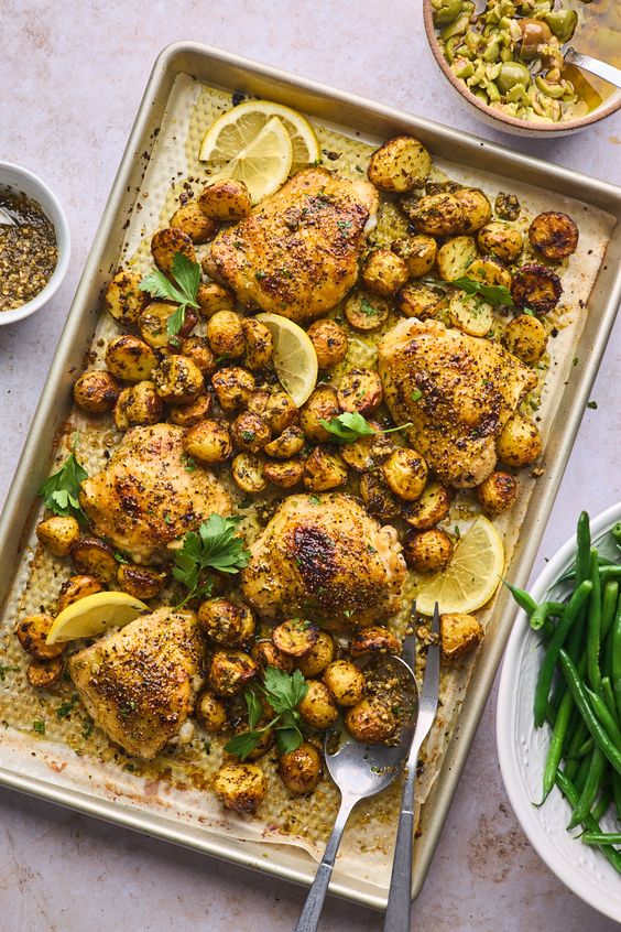 Sheet pan chicken with potatoes and green beans.