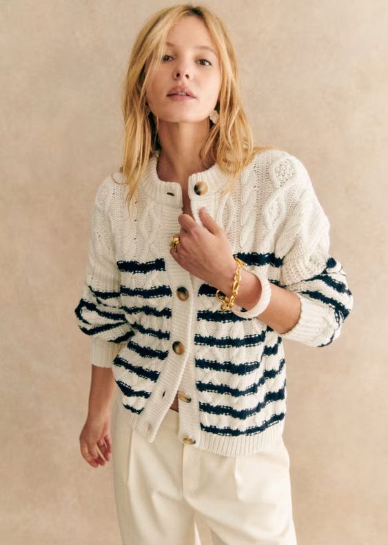blue and white cardigan. 