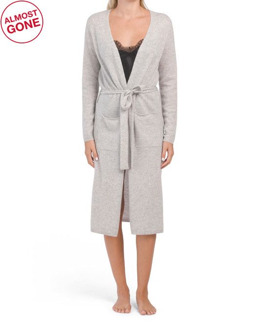 Woman wearing a tan cashmere robe. 