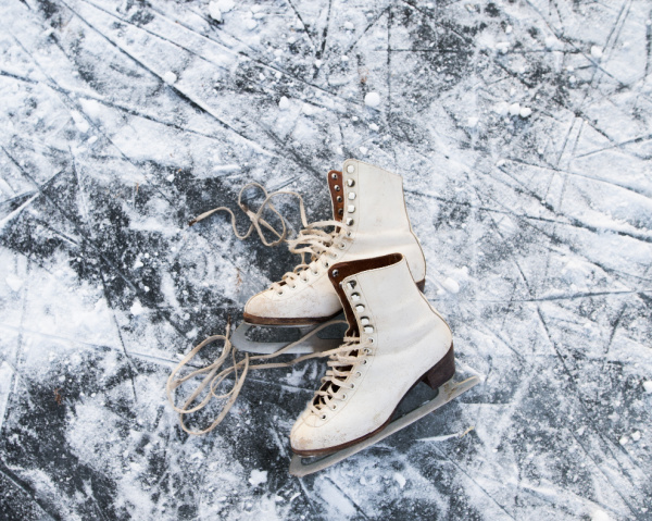 ice skates on a frozen pond