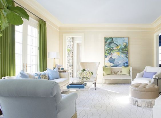 Lynn Morgan Design, white living room, green curtains and blue, green and white art.