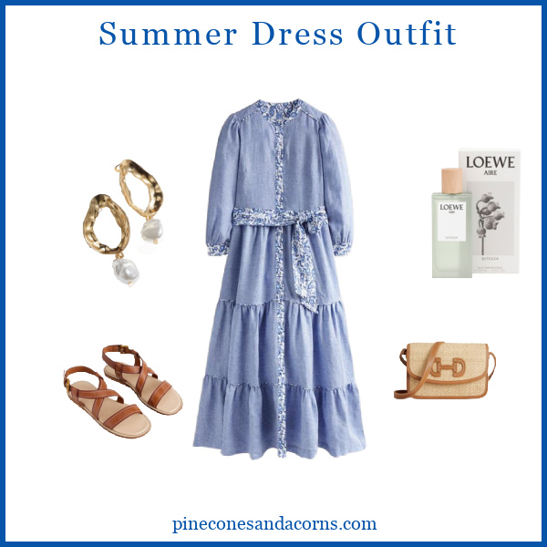 Fashion over 50 Summer Dress Outfit with a blue dress with flower trim, brown sandals, brown wicker bag, pearl earrings and perfume.