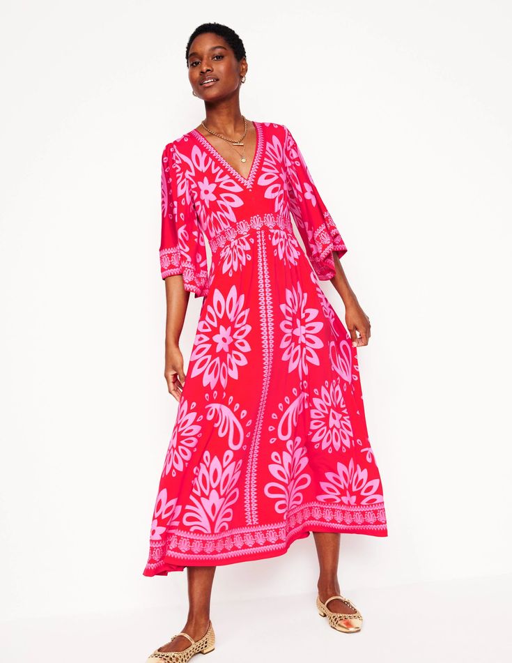 Fuchsia and white dress.