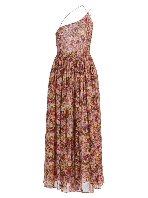 Ô E N's Felicity dress is crafted of luxurious silk and features a smocked one-shoulder design. A full flared skirt and beautiful floral print complete this sleeveless style.