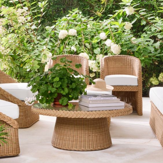 Aerie Lauder Collection Williams Sonoma, round table and 4 wicker chairs.