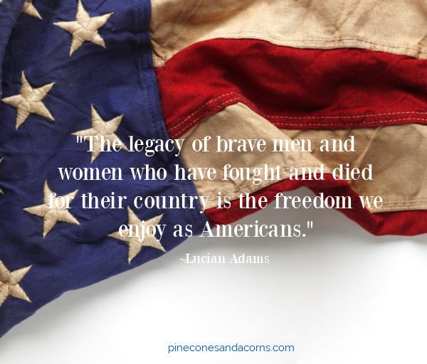 Memorial Day quote The legacy of brave men and women who have fought and died for their country is the freedom we enjoy as Americans, overlay on tan America flag. 