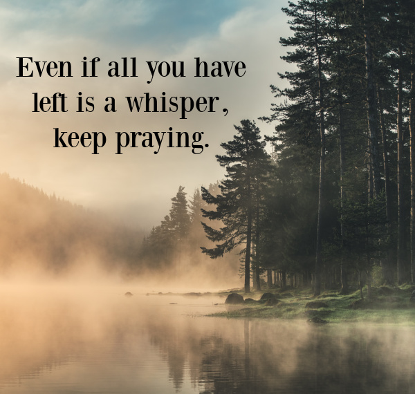 Quote, even if all you have left is a whisper keep praying, overlay in a lake with pine trees on the edge and fog drifting over the top.
