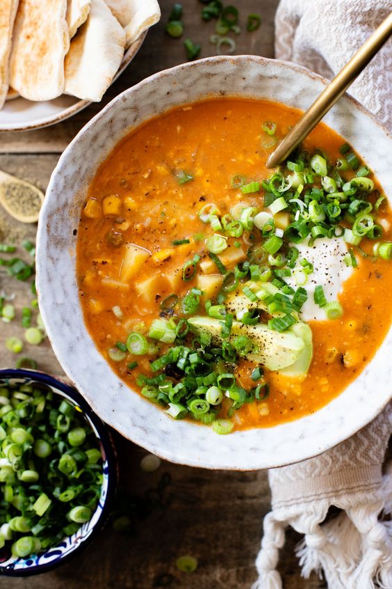 Buffalo Corn Chowder in a bowl sprinkled with fresh herbs. 