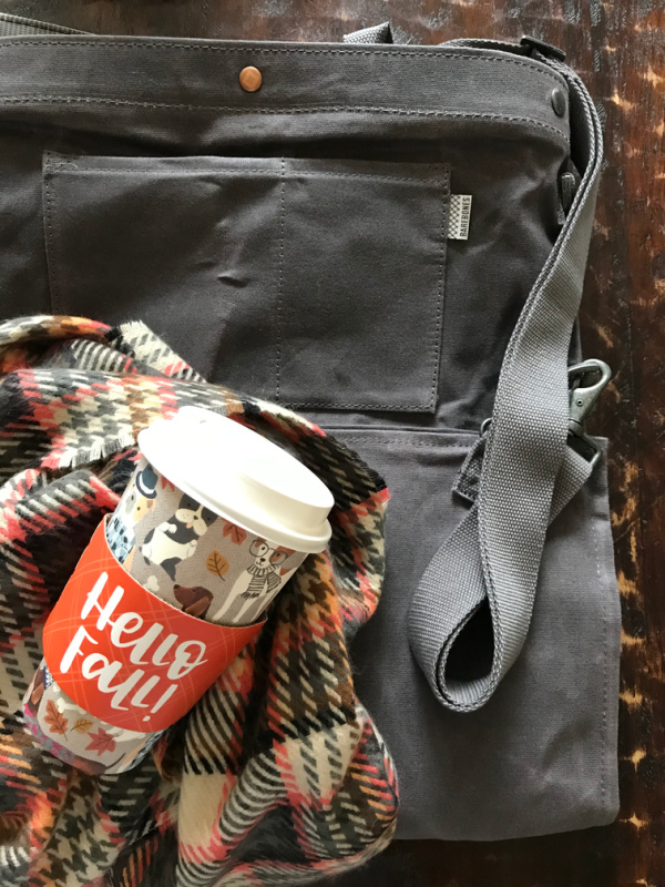 Barebones Gathering bag, plaid scarf and an orange hello fall cup.