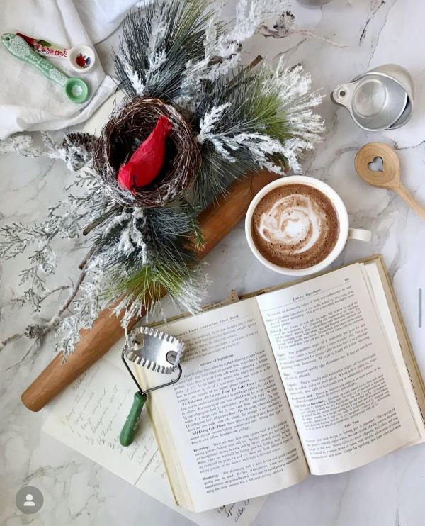 Christmas Baking Flatlay with rolling pin and vintage cookbook. 