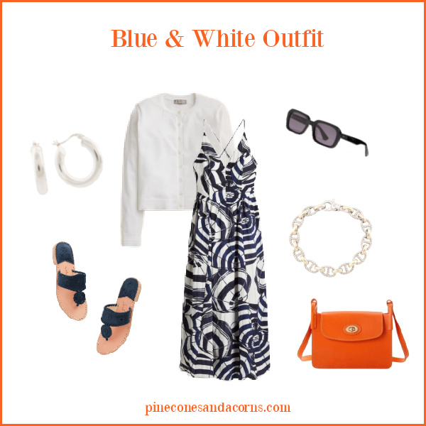 Blue and white outfit with orange accents Fashion over 50 with orange bag, blue sandals, silver earrings and bracelet, black sunglasses, white sweater and a blue and white dress.