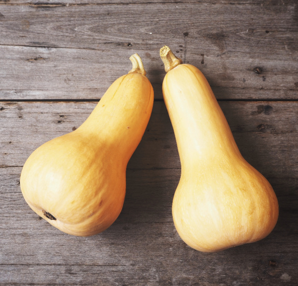 fall-fruits-and-vegetables, Two Butternut Squash on a wood background.