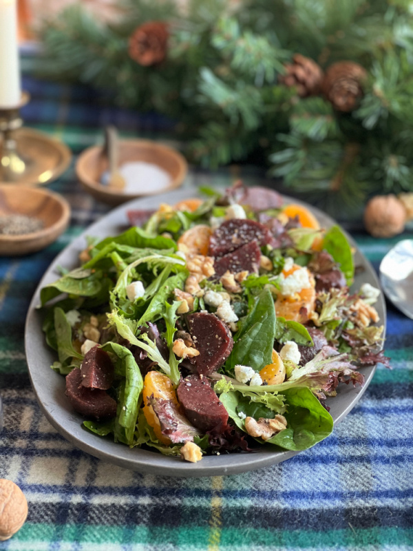 Roasted beet and orange salad on a vintage pewter salad.