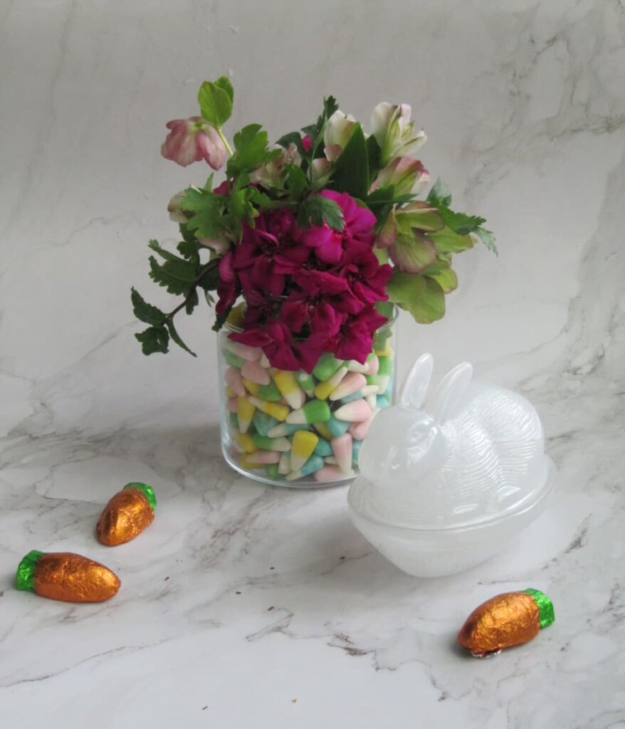 Easter morning — a simple Easter table detail with spring flowers and candles 