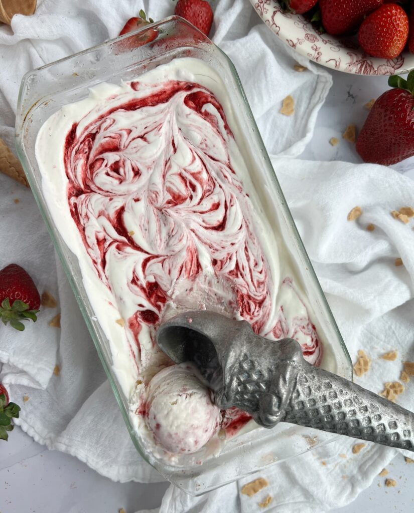 strawberry ice cream and an ice cream scoop