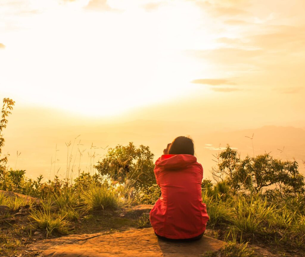 Woman sitting quietly in the morning — going through menopause the symptoms nobody tells you about